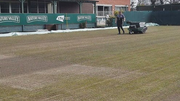 Top dressing of Court 4 during autumn renovation 